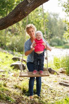 Young mother with adorable daughter