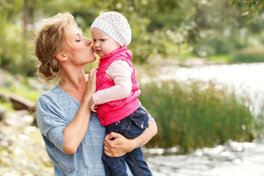 Young mother with adorable daughter