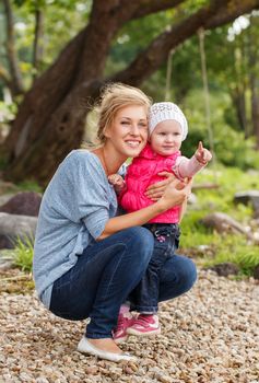 Young mother with adorable daughter