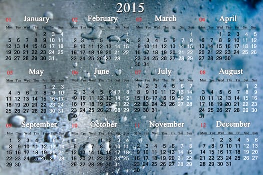 calendar for 2015 year on the glass surface with drops