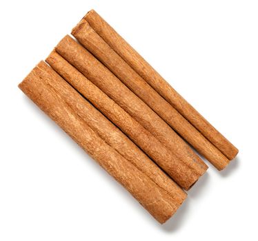 Cinnamon sticks on white background. Top view