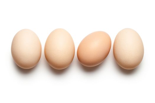 Chicken eggs on white background. Top view