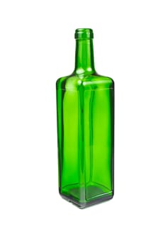 Empty green glass bottle isolated on white background