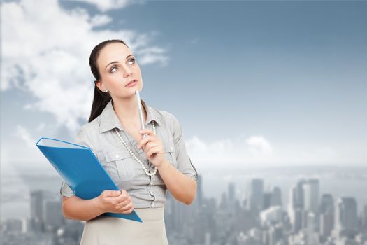 An image of a beautiful business woman in front of the big city