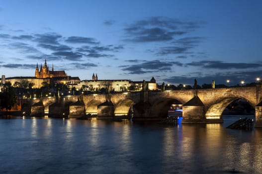 St. Vitus Cathedral and Charles bridge at night, Prague, Czech Republic.