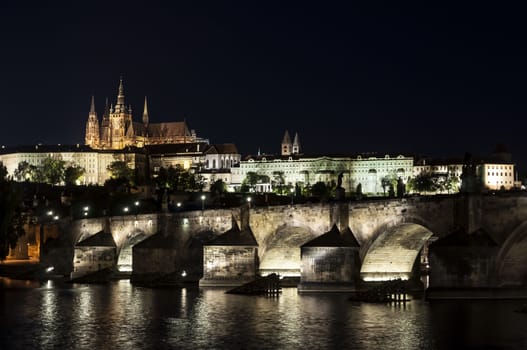 St. Vitus Cathedral and Charles bridge at night, Prague, Czech Republic.