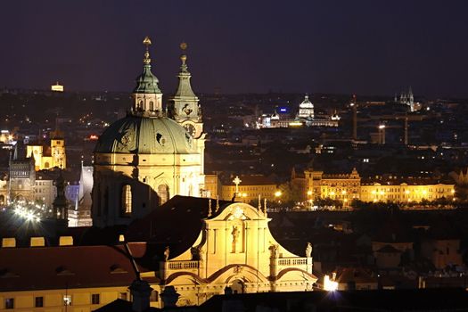 Photo shows details of Prague city at night.