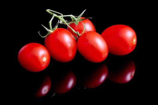 Tomatoes on black