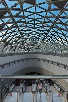 BUDAPEST, HUNGARY - AUGUST 17: Passengers passing by on the escalator  in Budapest, Hungary onAugust 17, 2014