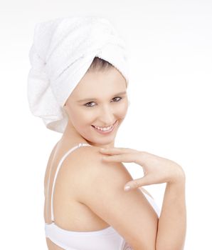 Beautiful Young Woman with Towel on her Head Smiling - Isolated on White