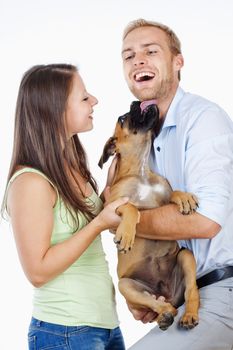 Portrait of a Happy Young Couple with a Dog.