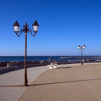 Promenade near mediterranean sea, Saintes-Maries-de-la-mer, Camargue, France