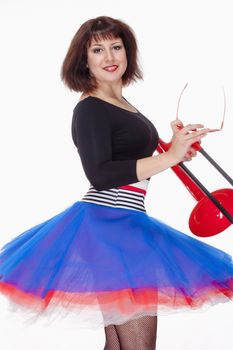 Young Female Musician with Red Trombone Dancing - Isolated on White