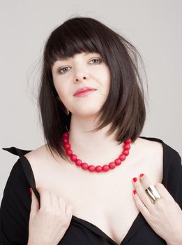 Portrait of a Young Beautiful Woman with Dark Brown Hair Looking