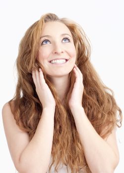 Young Woman with Long Hair Looking up Smiling - Isolated on White