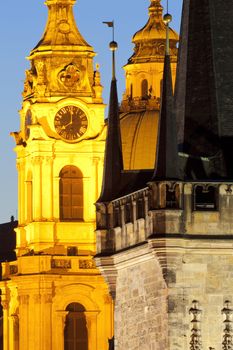 prague - different architectural styles-st. nicolas church and charles bridge tower