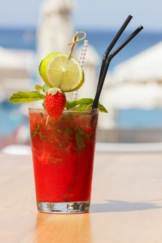 Strawberry cocktail on the beach