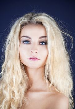 portrait of a young beautiful woman with long blond hair