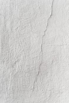 white wall with cracks