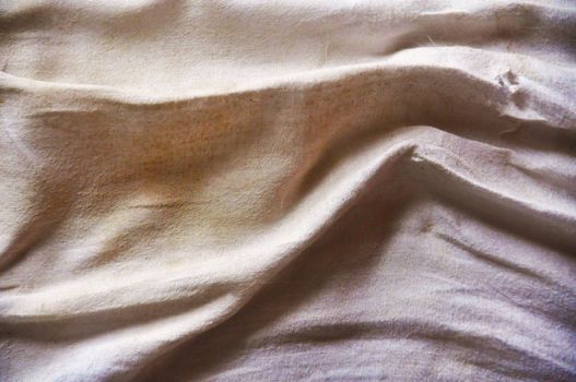 Linen fabric with deep shadows and ancient colors