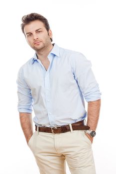 man in blue shirt and light trousers standing, looking - isolated on white