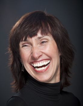 portrait of a middle-aged woman laughing