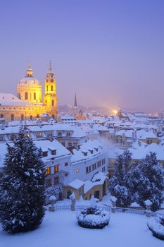 prague - st. nicolas church and rooftops of mala strana in winter