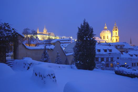 prague in winter - lesser town (mala strana) and hradcany castle at dusk