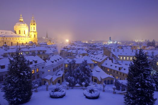 prague - st. nicolas church and rooftops of mala strana in winter