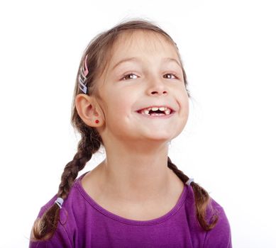 portrait of a little girl with braids - isolated on white