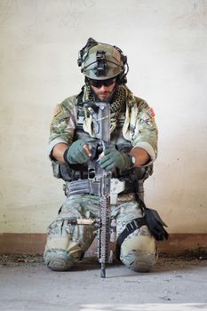 Portrait of american soldier resting from military operation