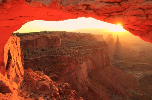 Glowing Mesa Arch at sunrise, Canyonlands National Park, Utah