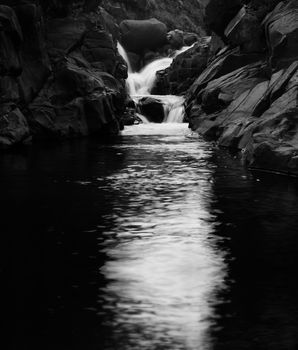 Black and white river waterfall at Lotheni, KwaZulu-Natal in the South African Drakensburg mountains