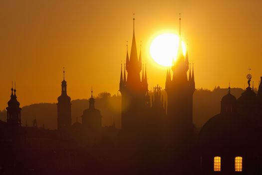 czech republic, prague - spires of the old town and tyn church at sunrise