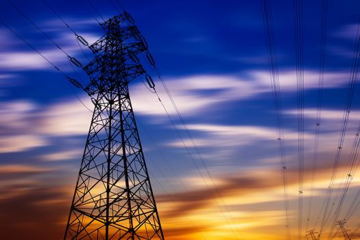 High voltage tower at sunset