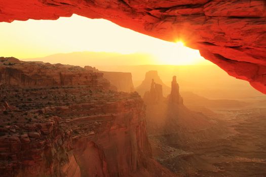 Glowing Mesa Arch at sunrise, Canyonlands National Park, Utah