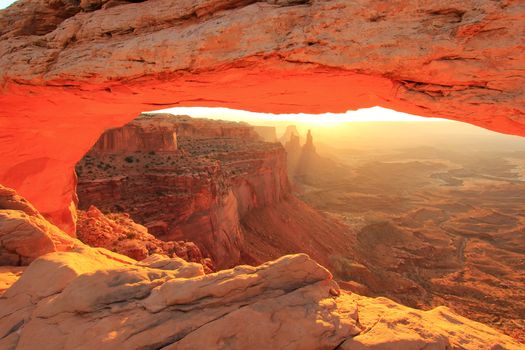 Glowing Mesa Arch at sunrise, Canyonlands National Park, Utah