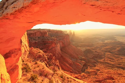 Glowing Mesa Arch at sunrise, Canyonlands National Park, Utah