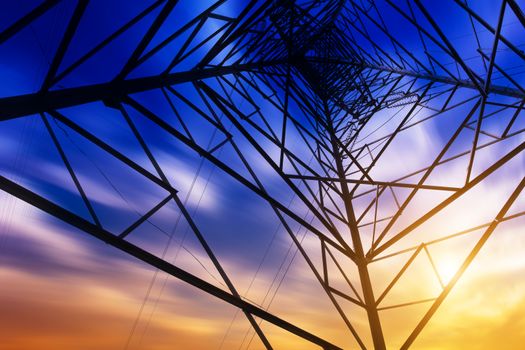 High voltage tower at sunset