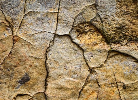 background or abstract texture old stone cracks partitioned