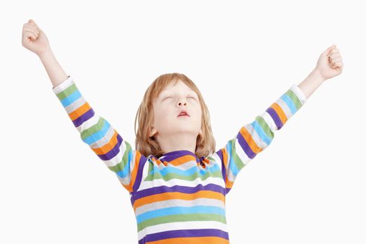 Boy with Closed Eyes Holding his Arms up - Isolated on White