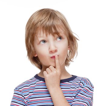 Boy Looking up Thinking, Finger on his Mouth - Isolated on White