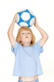 boy with long blond hair holding a football - isolated on white