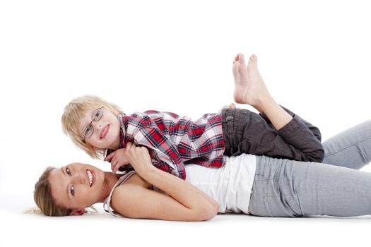 mother and son having fun enjoying time with each other - isolated on white