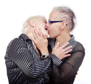 two lesbian women with punk hairstyle kissing - isolated om white