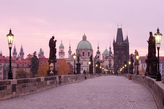 czech republic prague - charles bridge and spires of the old town at dawn