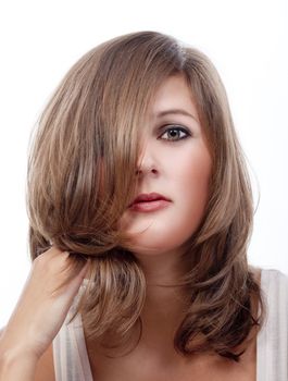 portrait of a young woman with brown hair - isolated on white