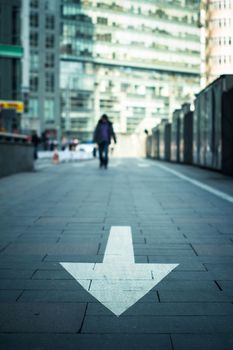 arrow on the road in city
