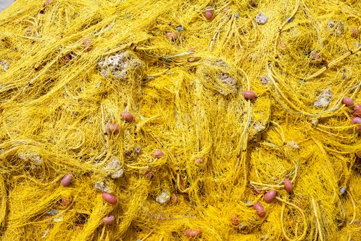 Yellow fishing net with floats background