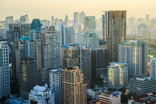 View of Bangkok skyline in the evening. This picture was taken at the commercial center of Bangkok, Thailand.